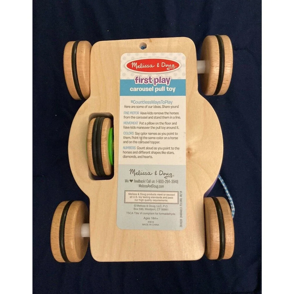 Melissa & Doug (3616) First Play Carousel Pull Toy